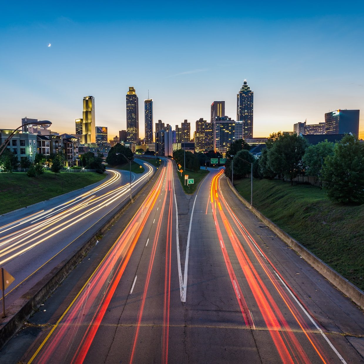 timelapse photo of highway during golden hour